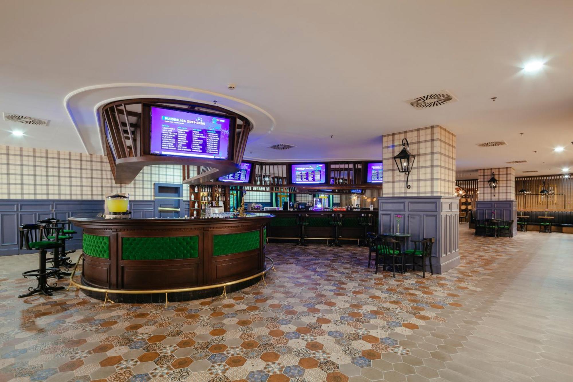 พีจีเอส เครมลิน พาเลซ Hotel อันตัลยา ภายนอก รูปภาพ The bar at the hotel